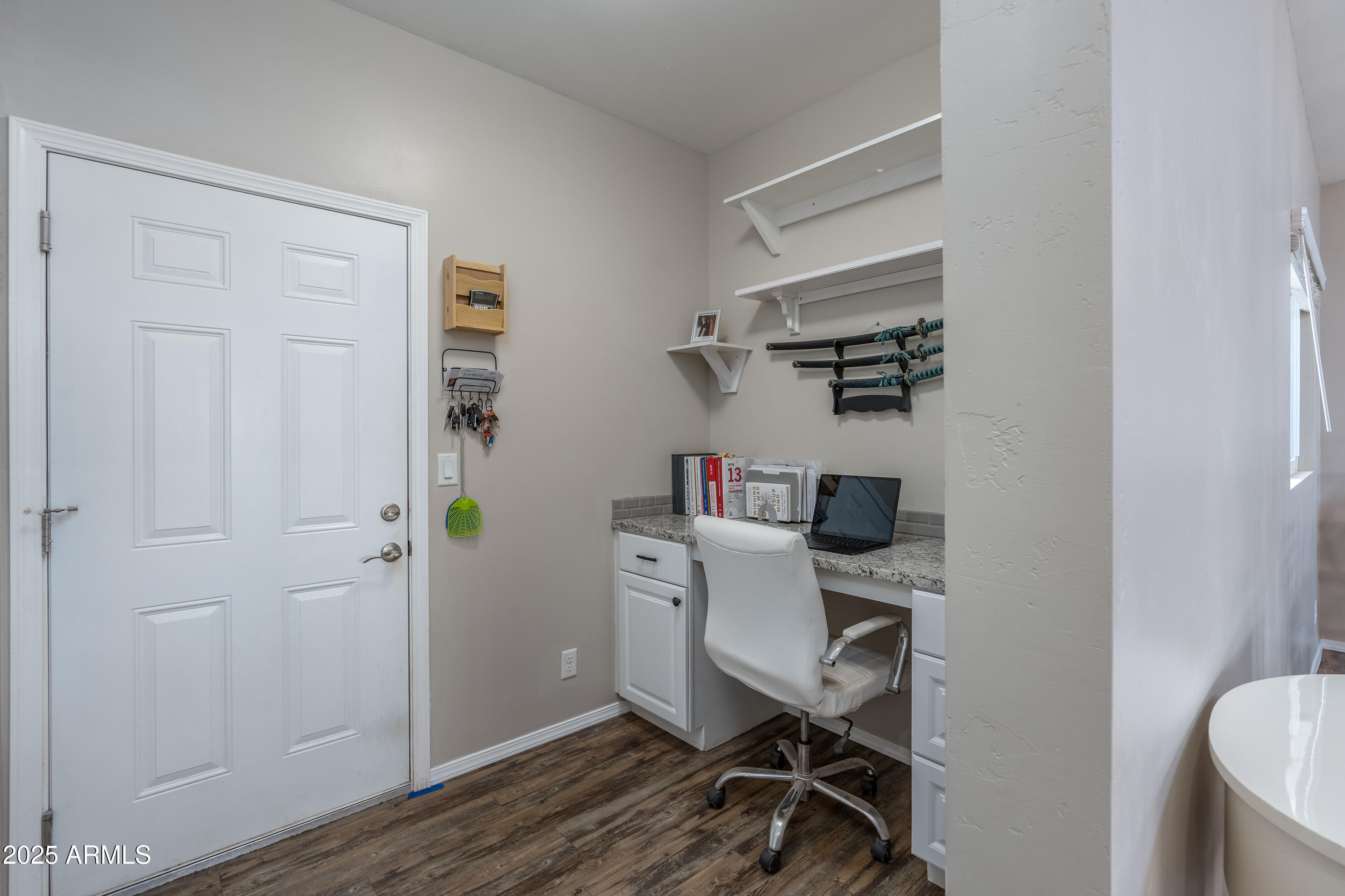 955 West Copperhead Road Camp Verde, AZ 86322 - Photo 9 of 35 a view of a workspace with furniture and wooden floor