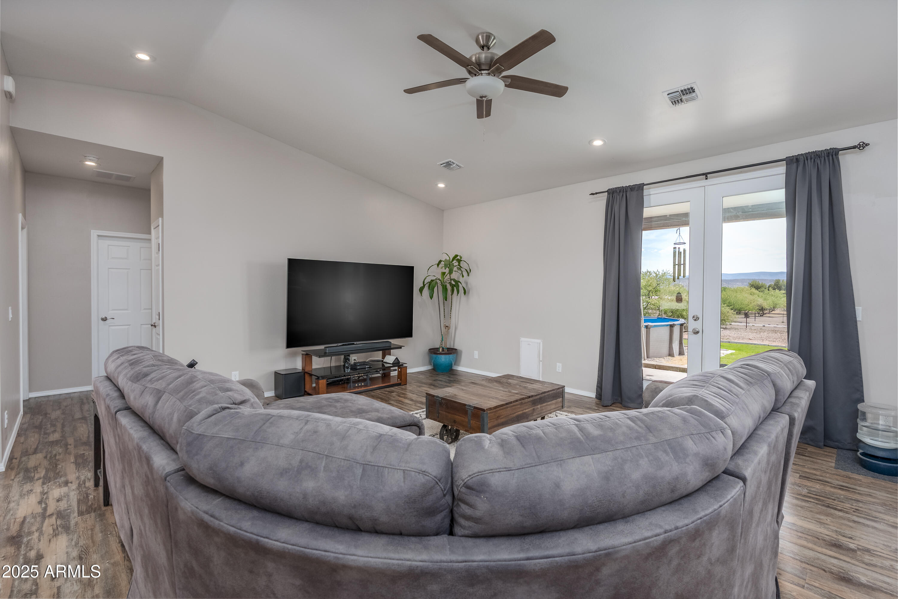 955 West Copperhead Road Camp Verde, AZ 86322 - Photo 22 of 35 a living room with furniture and a flat screen tv