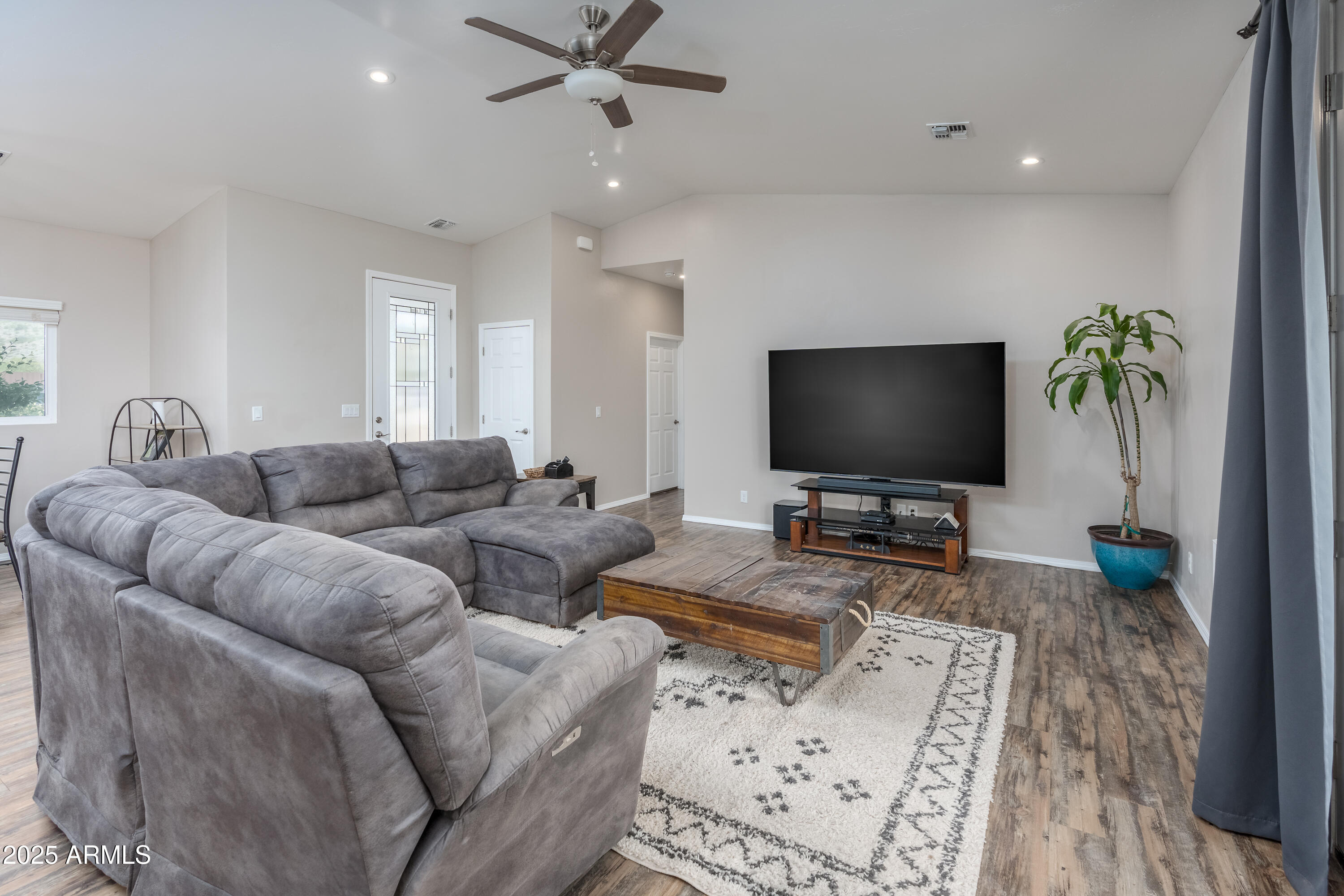 955 West Copperhead Road Camp Verde, AZ 86322 - Photo 2 of 35 a living room with furniture and a flat screen tv