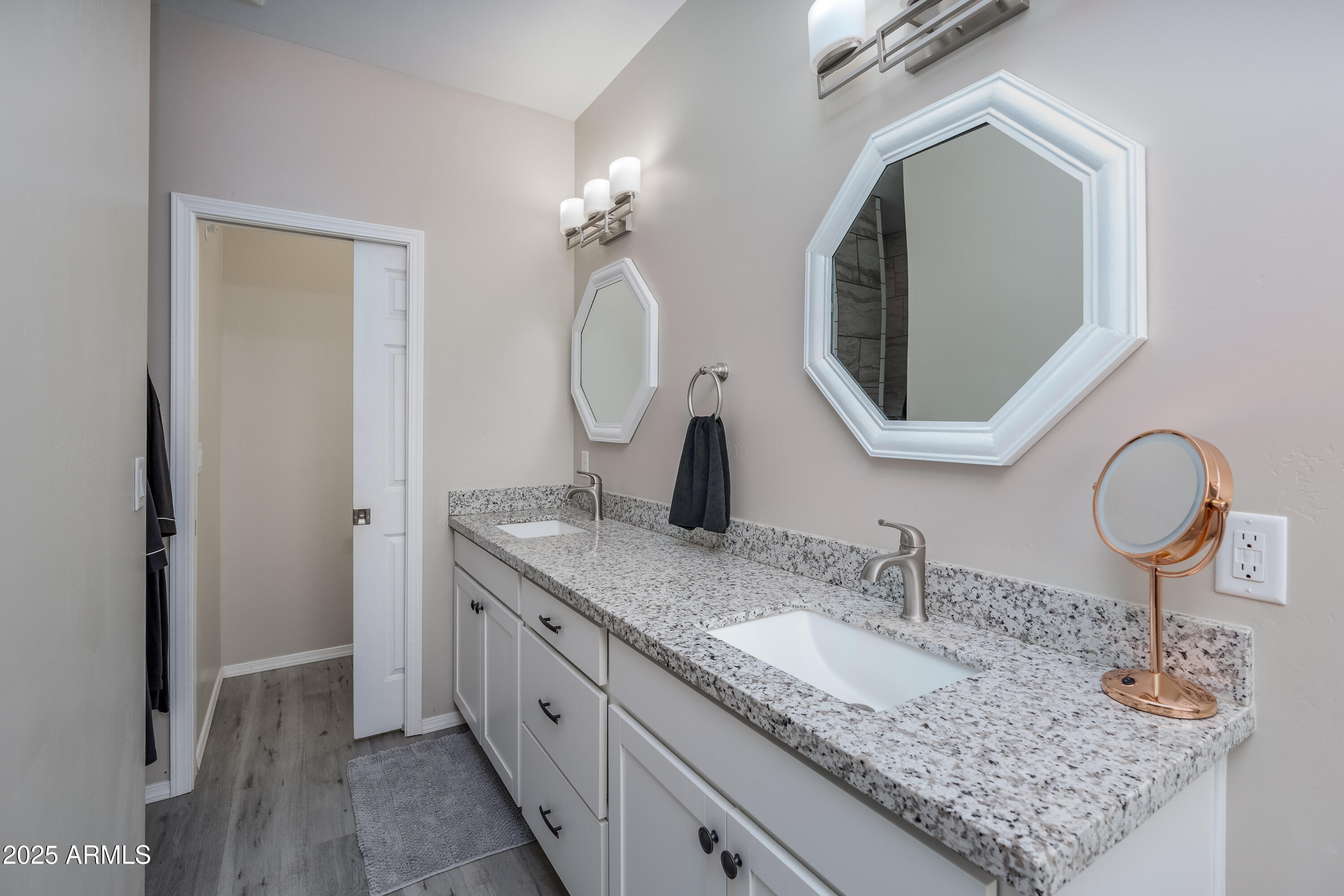955 West Copperhead Road Camp Verde, AZ 86322 - Photo 5 of 35 a bathroom with a granite countertop double vanity sinks and a mirror