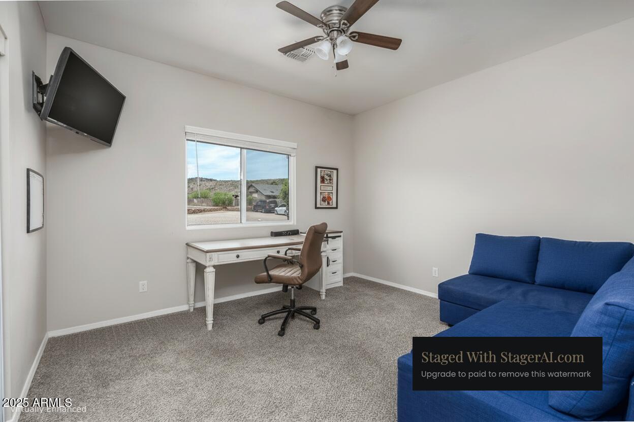 955 West Copperhead Road Camp Verde, AZ 86322 - Photo 8 of 35 a view of a livingroom with workspace and a couch