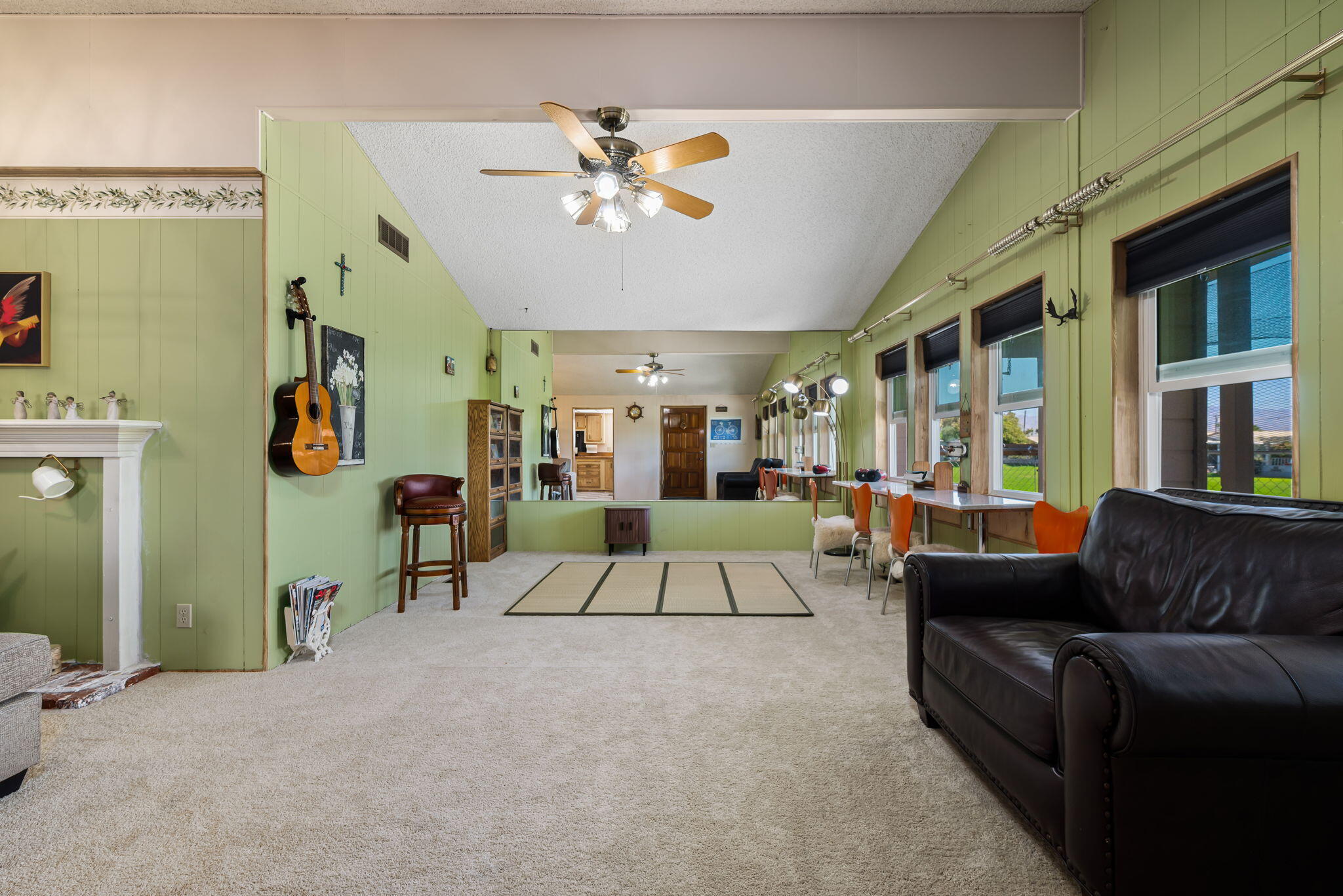 33204 Laredo Circle Thousand Palms, CA 92276 - Photo 19 of 62 a living room with furniture and a flat screen tv