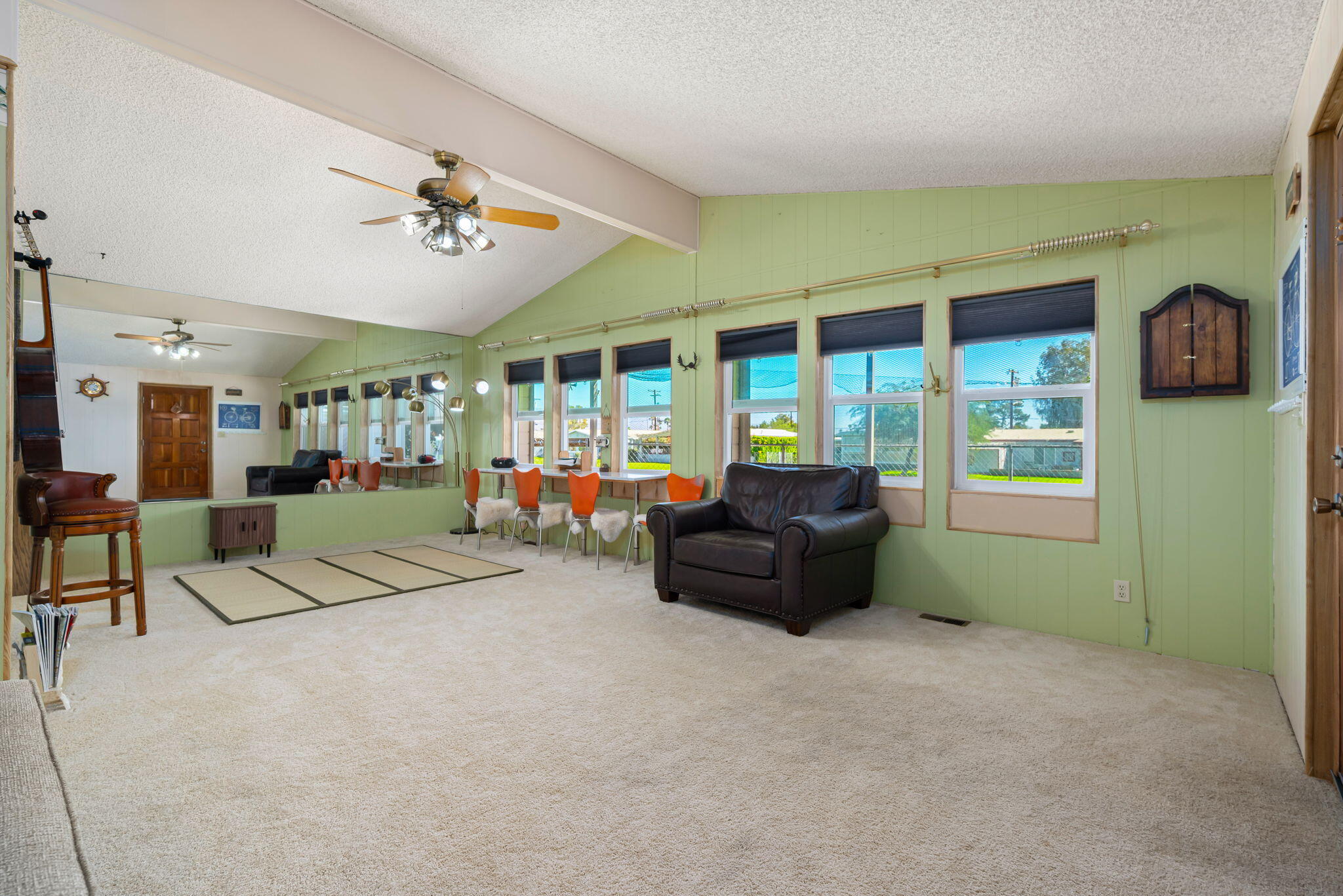 33204 Laredo Circle Thousand Palms, CA 92276 - Photo 20 of 62 a living room with furniture and a window