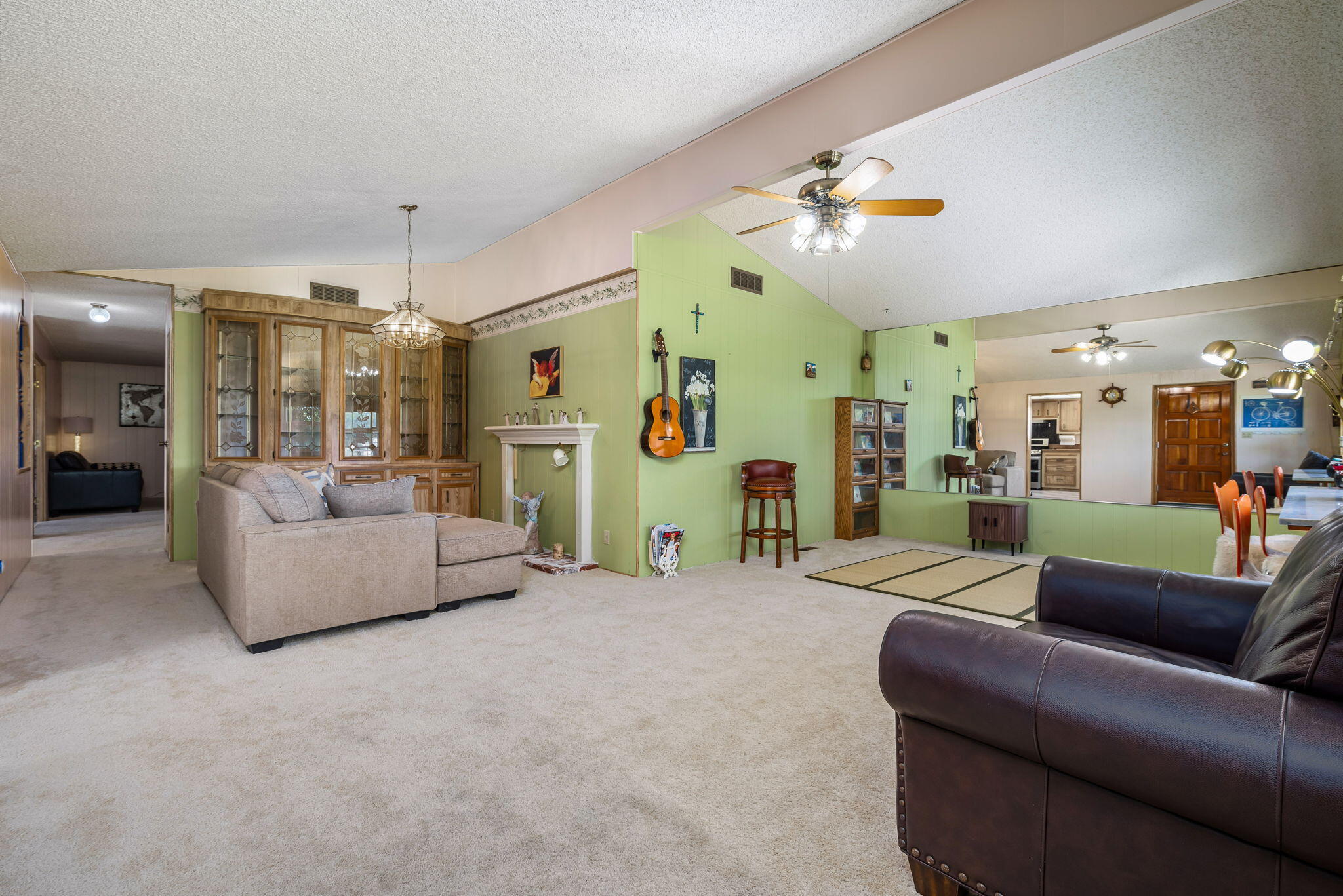 33204 Laredo Circle Thousand Palms, CA 92276 - Photo 21 of 62 a living room with furniture and kitchen view