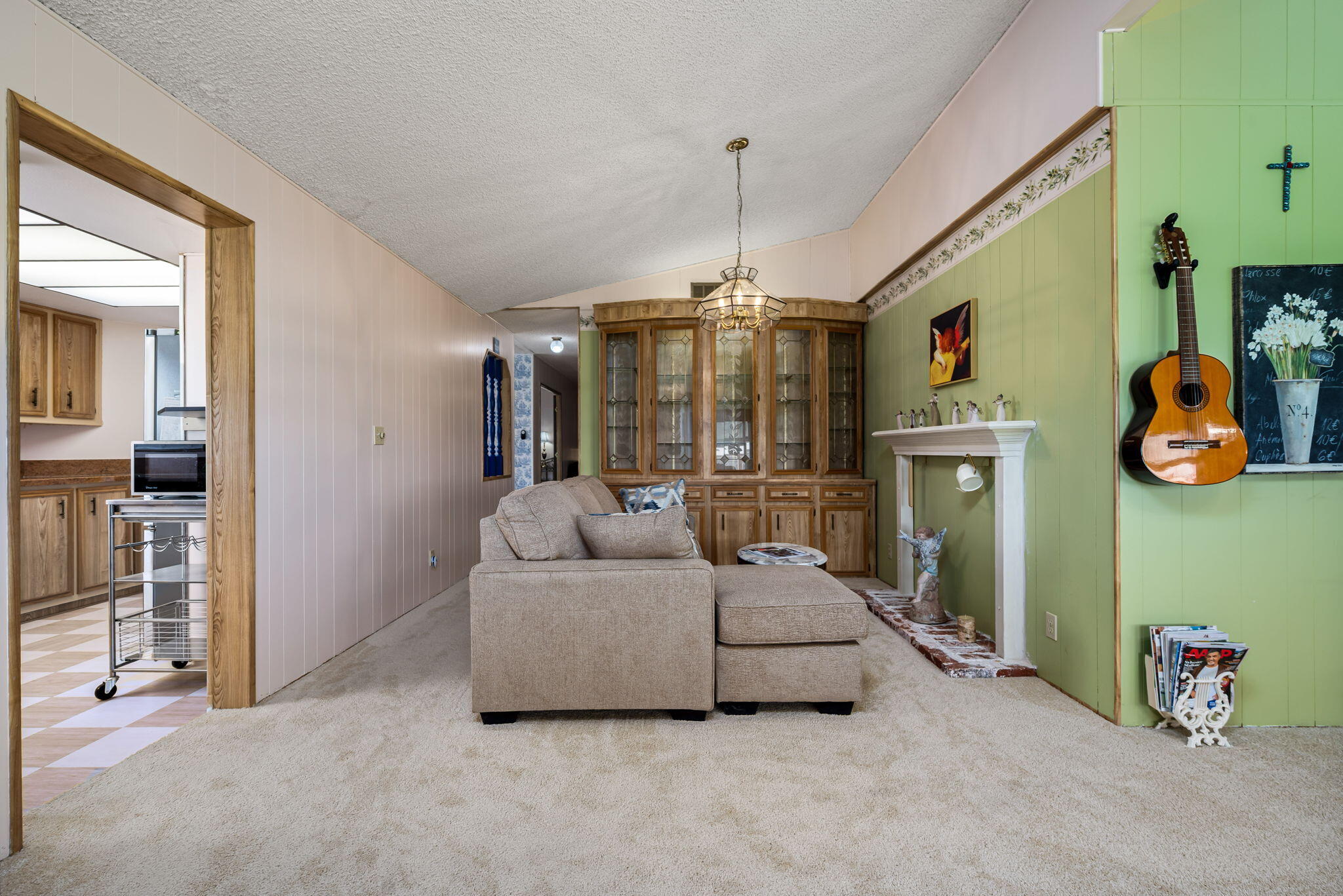 33204 Laredo Circle Thousand Palms, CA 92276 - Photo 24 of 62 a living room with furniture and a chandelier