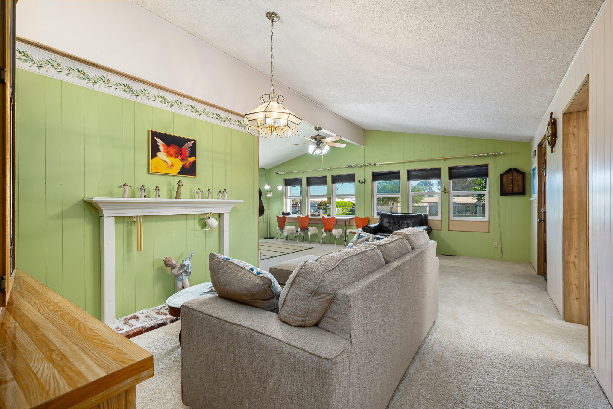33204 Laredo Circle Thousand Palms, CA 92276 - Photo 26 of 62 a living room with furniture and a chandelier