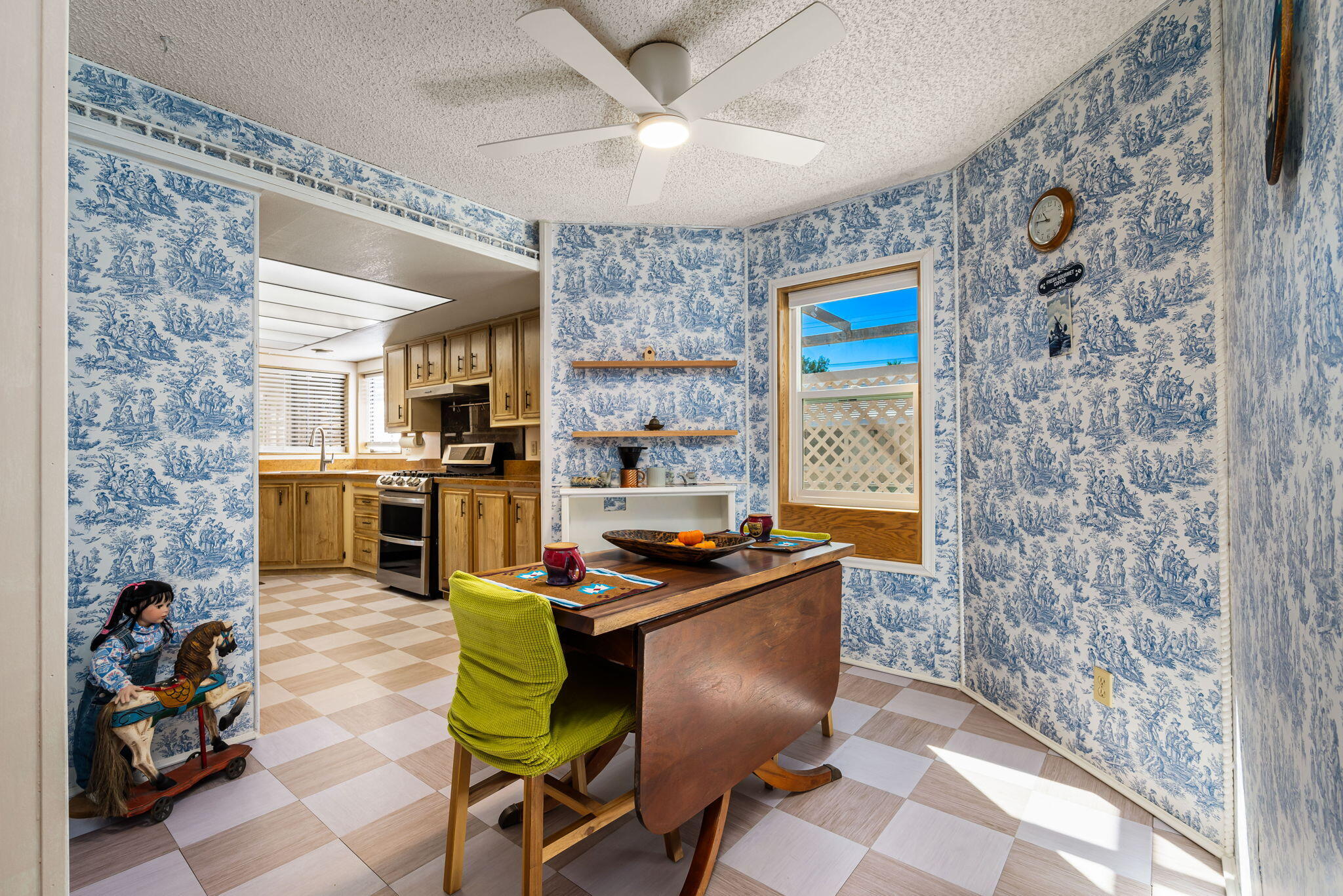 33204 Laredo Circle Thousand Palms, CA 92276 - Photo 34 of 62 a dining room with furniture and a fireplace