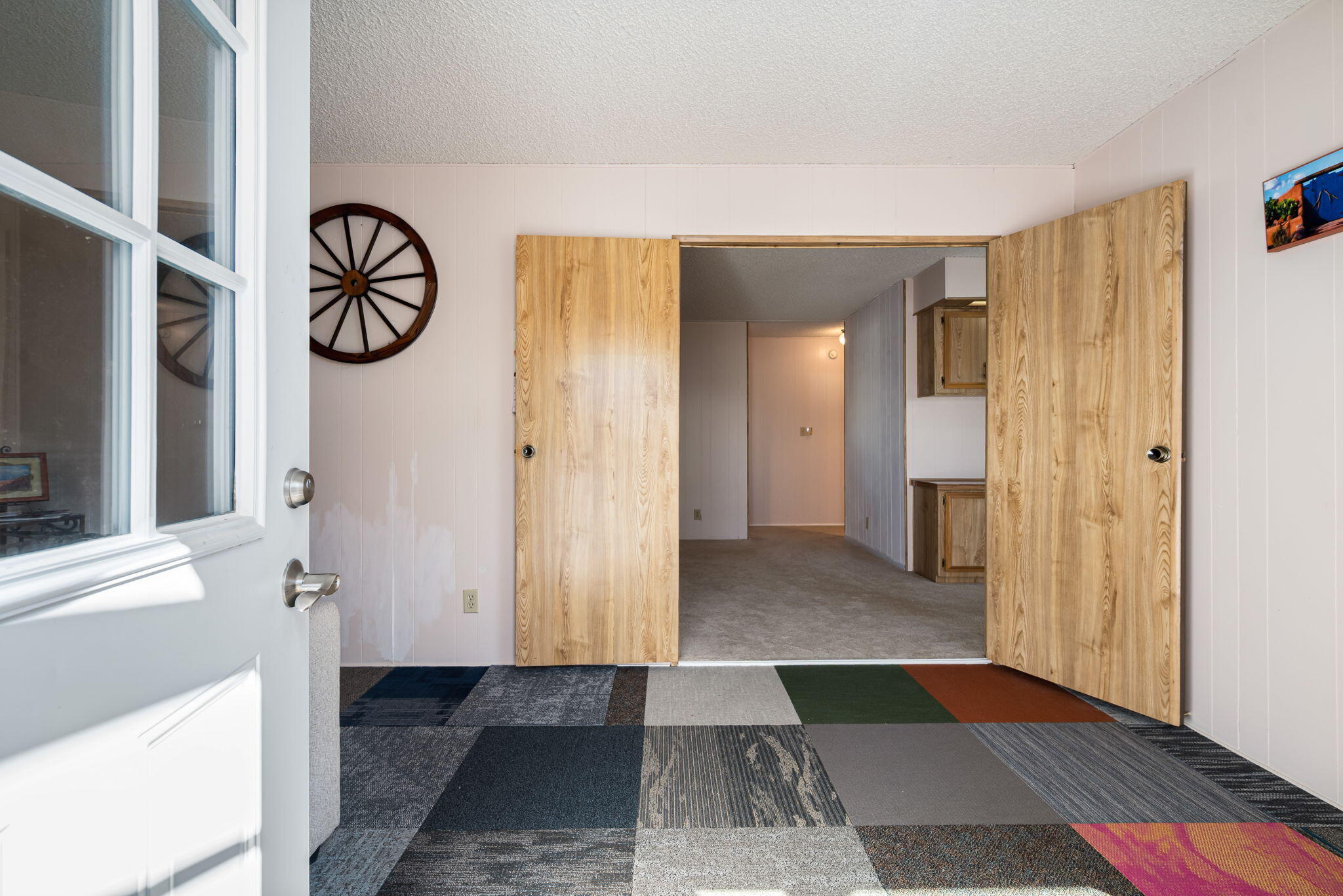 33204 Laredo Circle Thousand Palms, CA 92276 - Photo 39 of 62 a view of a hallway with elevator with wooden floor