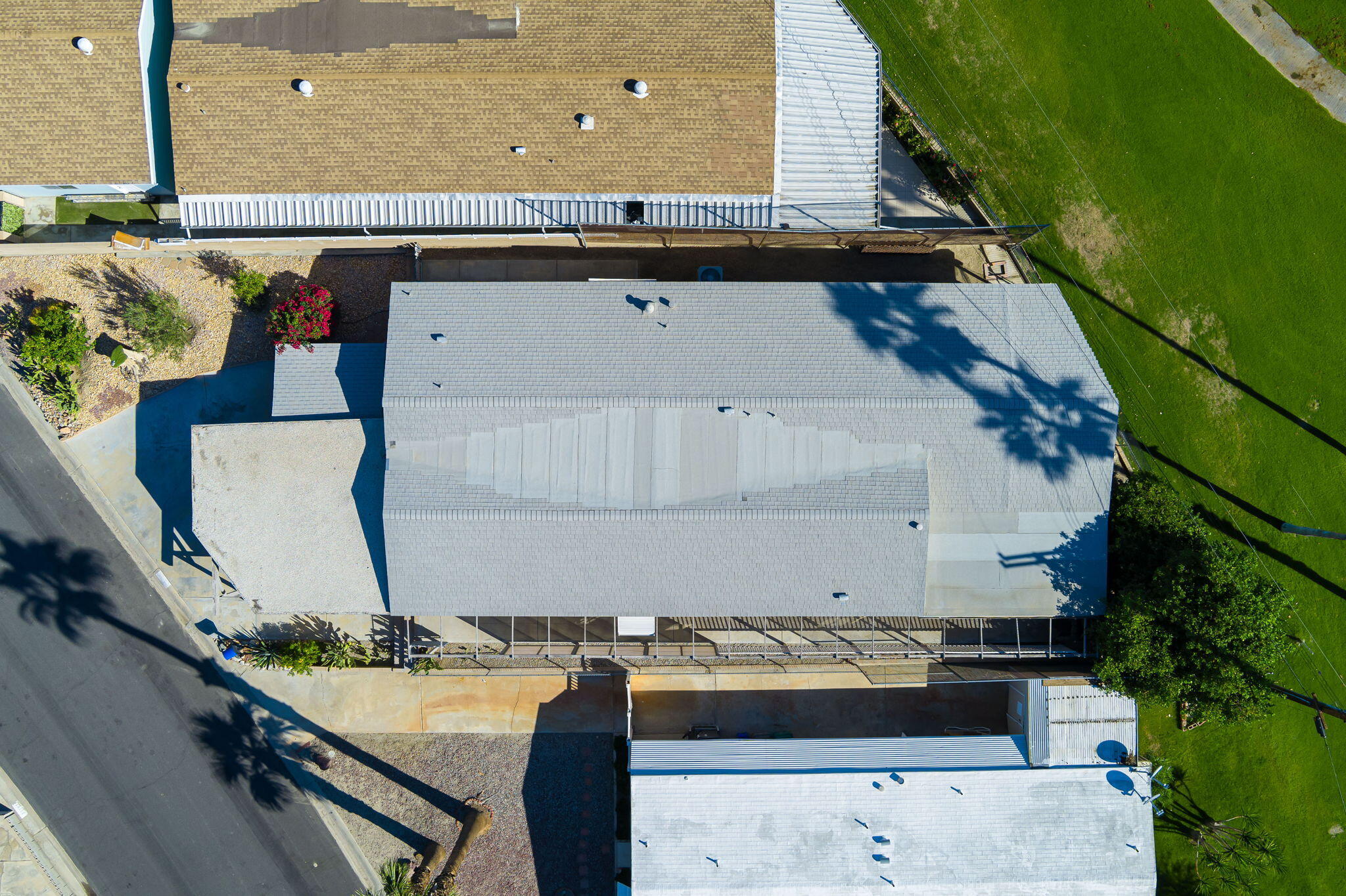 33204 Laredo Circle Thousand Palms, CA 92276 - Photo 4 of 62 an aerial view of a residential apartment building with a yard