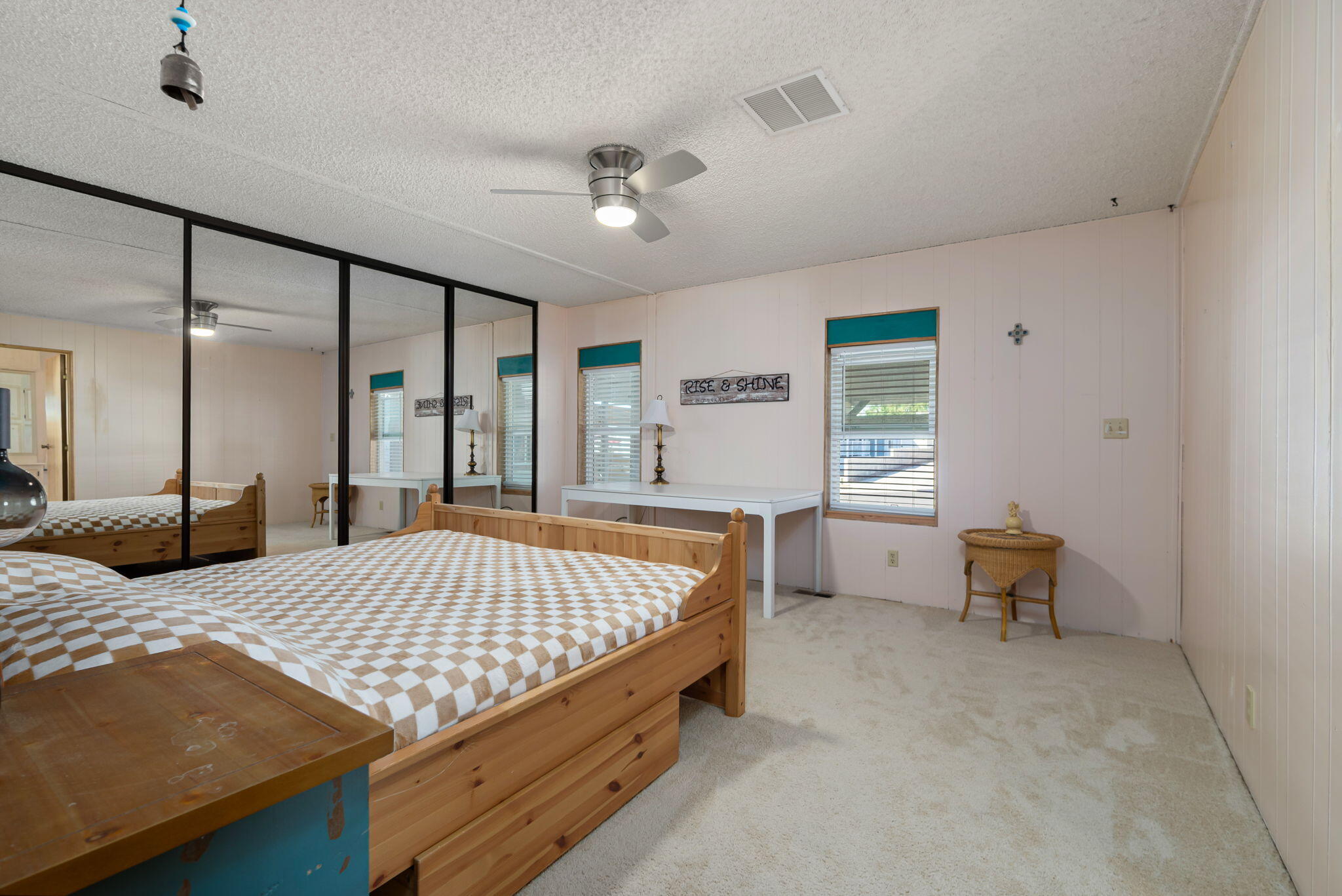 33204 Laredo Circle Thousand Palms, CA 92276 - Photo 43 of 62 a bedroom with a bed and window