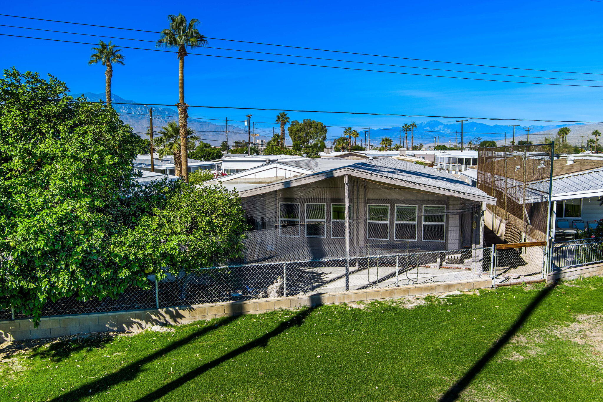 33204 Laredo Circle Thousand Palms, CA 92276 - Photo 6 of 62 a view of a house with a yard
