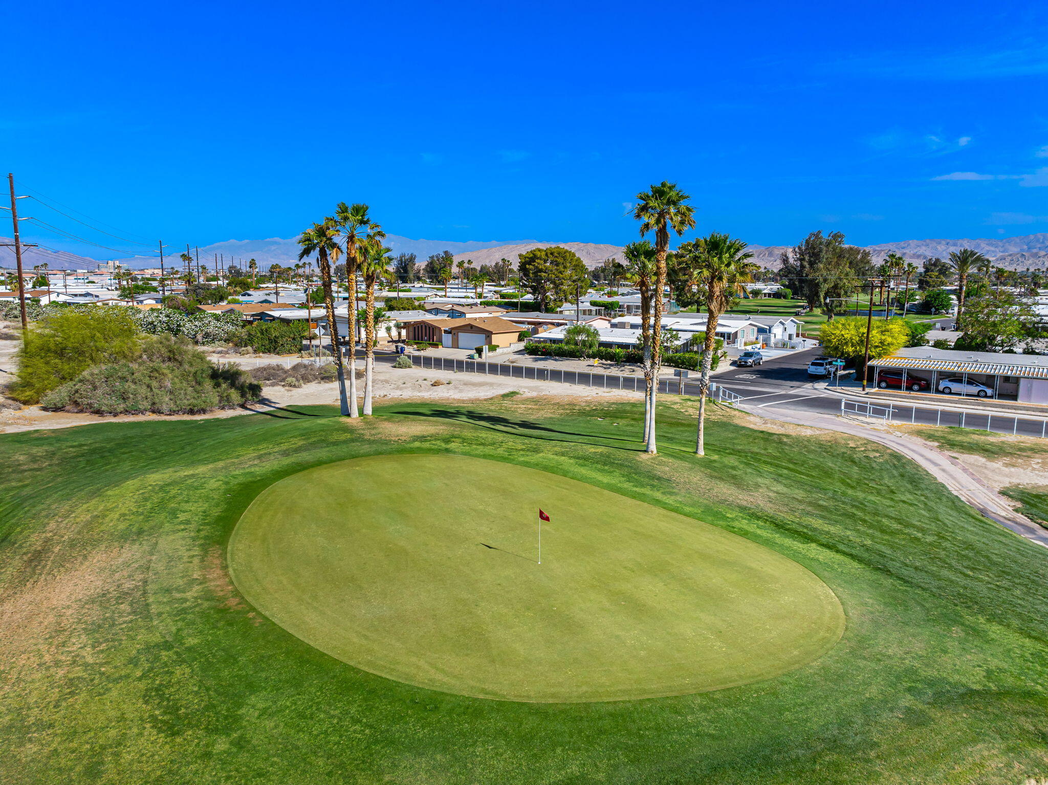 33204 Laredo Circle Thousand Palms, CA 92276 - Photo 61 of 62 a view of a playground with a house
