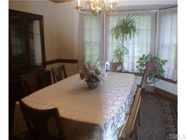 404 Chowning Place Raleigh, NC 27614 - Photo 4 of 25 Dining Room with bay windows