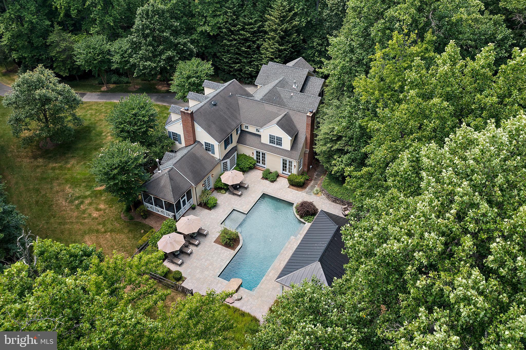 403 Beards Dock Crossing Annapolis, MD 21403 - Photo 11 of 96 an aerial view of house with yard swimming pool and outdoor seating