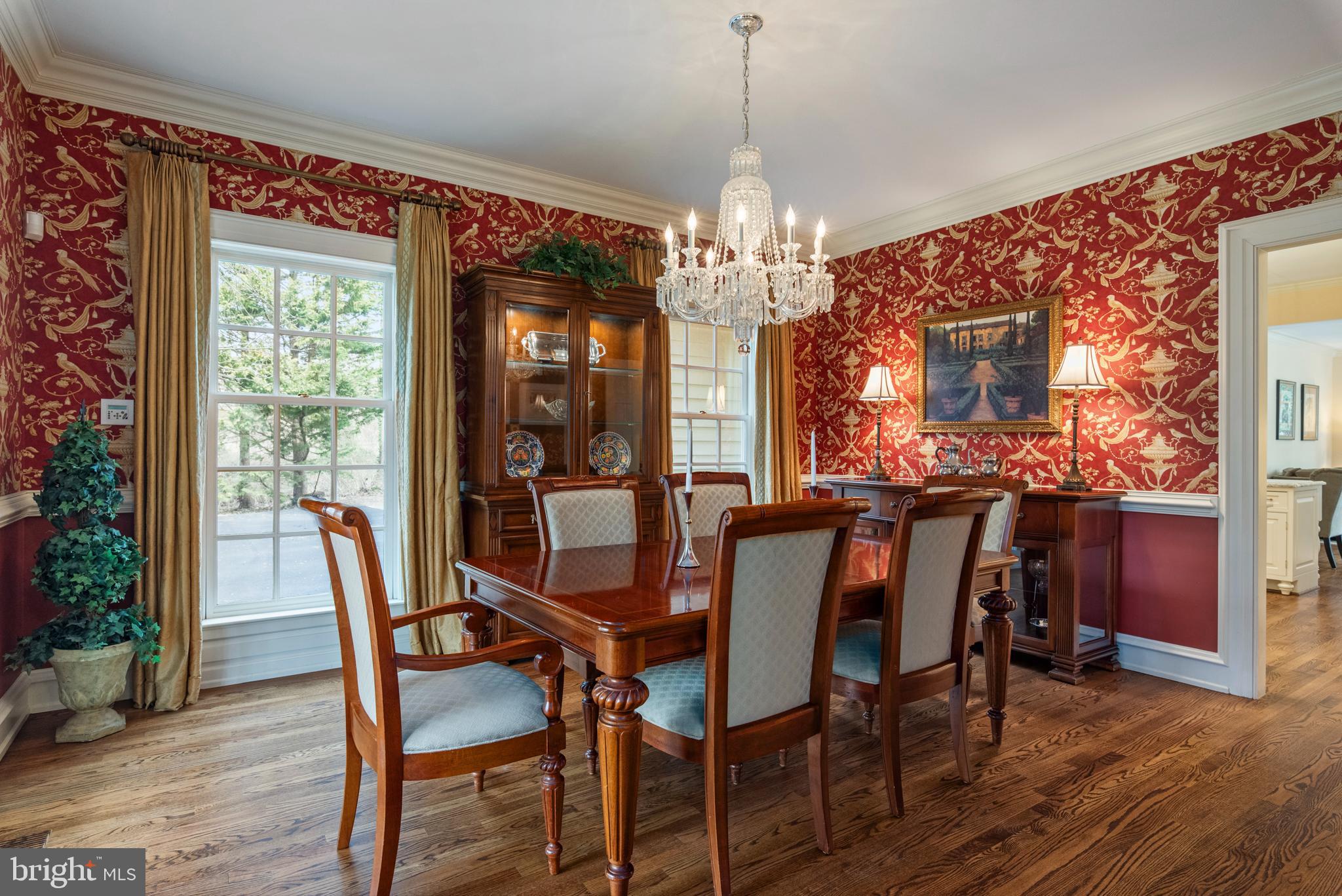 403 Beards Dock Crossing Annapolis, MD 21403 - Photo 22 of 96 a view of a dining room with furniture a chandelier and wooden floor