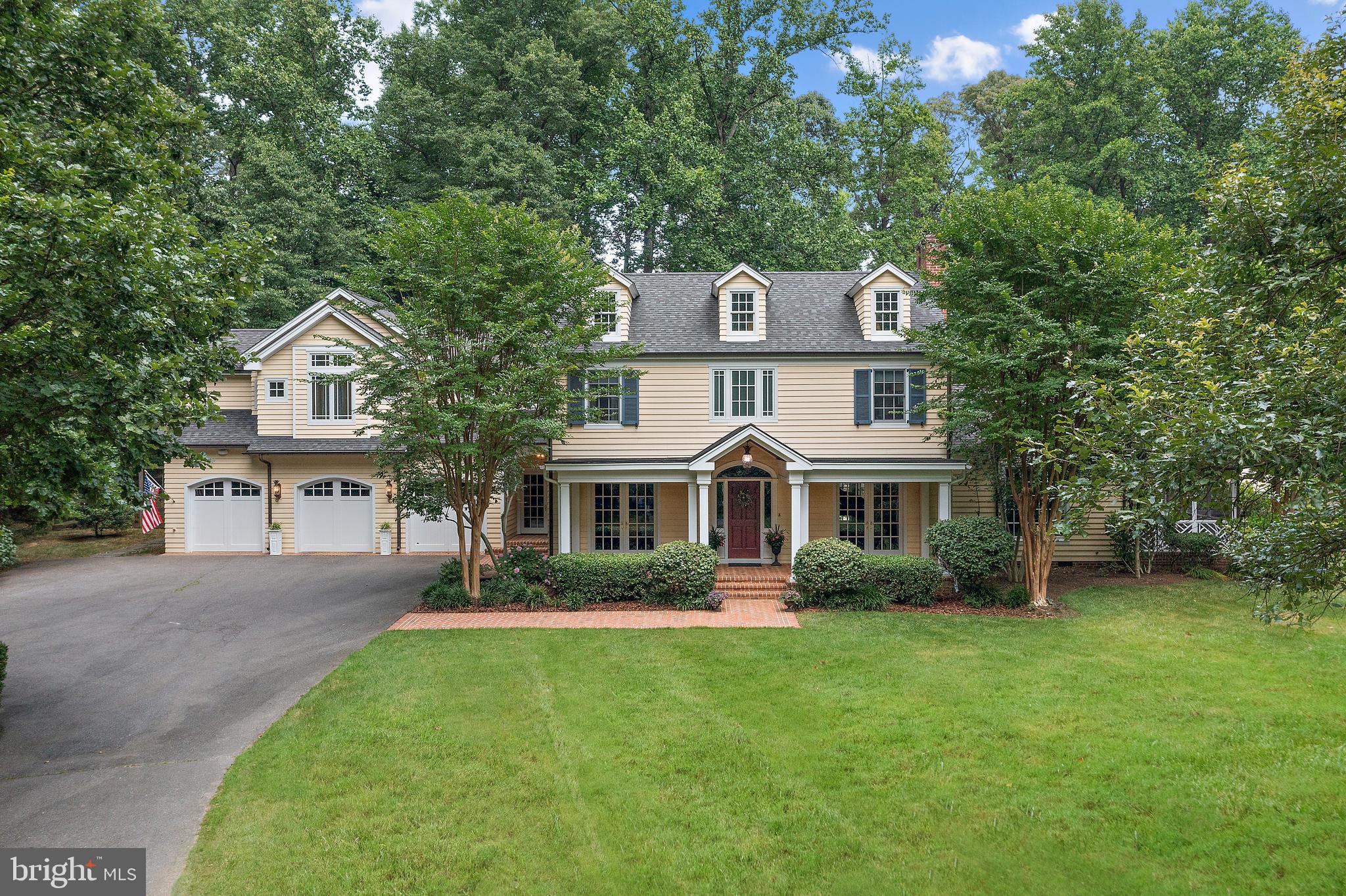 403 Beards Dock Crossing Annapolis, MD 21403 - Photo 3 of 96 a front view of a house with a garden and plants