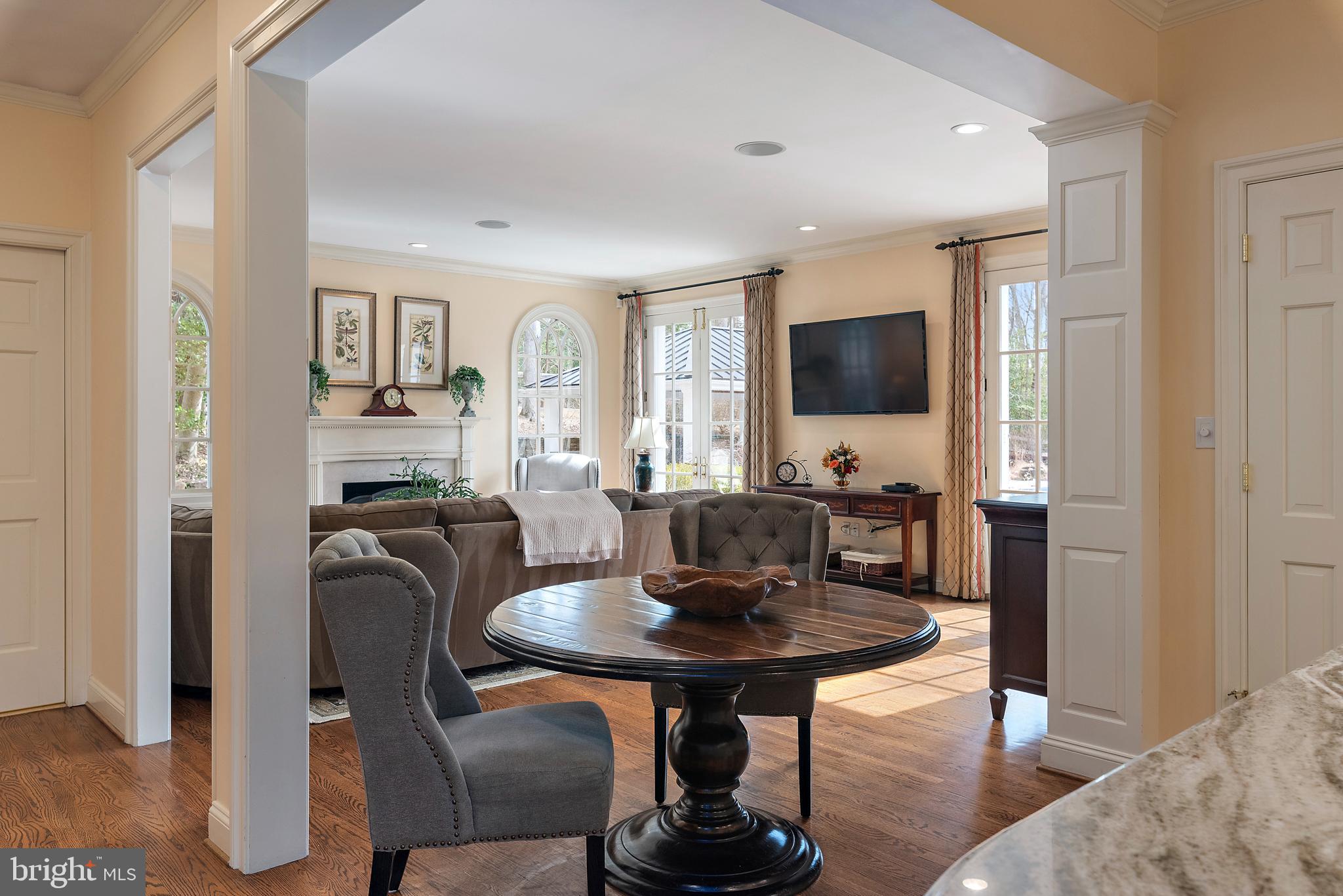 403 Beards Dock Crossing Annapolis, MD 21403 - Photo 31 of 96 a view of a dining room with furniture and wooden floor