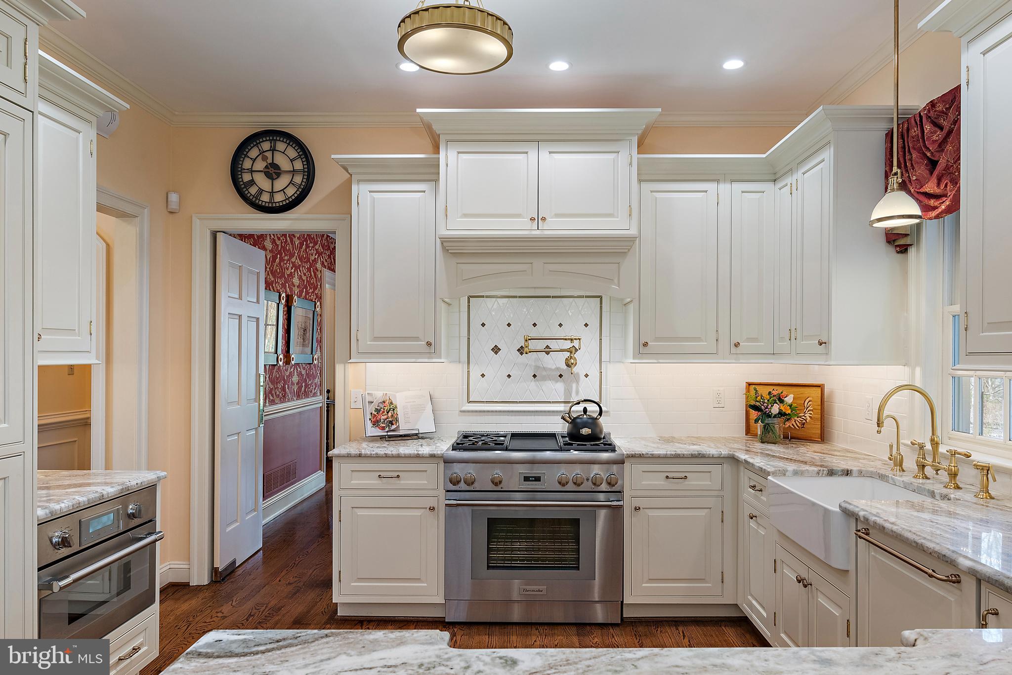 403 Beards Dock Crossing Annapolis, MD 21403 - Photo 33 of 96 a kitchen with a stove a sink and a refrigerator