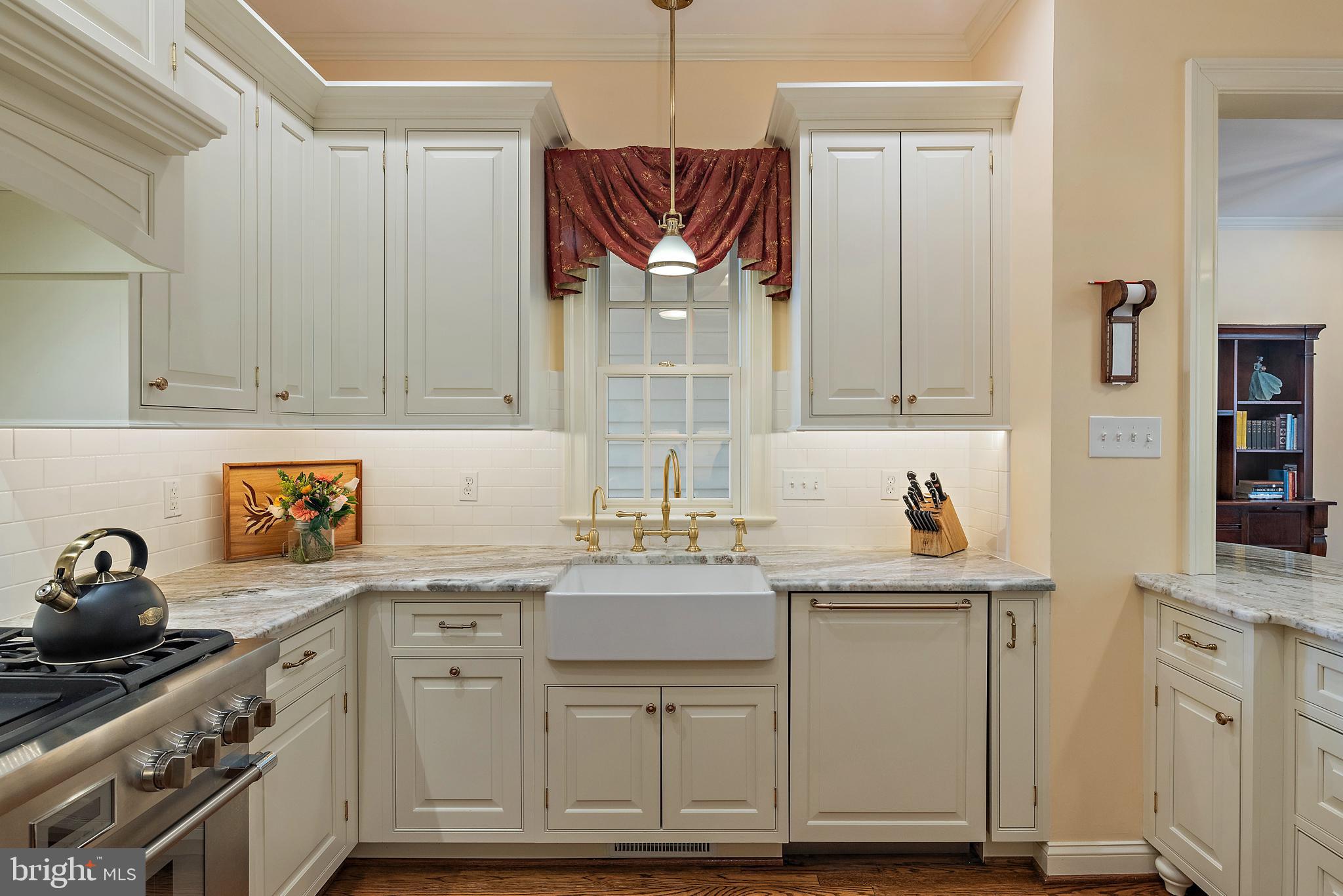 403 Beards Dock Crossing Annapolis, MD 21403 - Photo 35 of 96 a kitchen with stainless steel appliances granite countertop a sink stove and cabinets