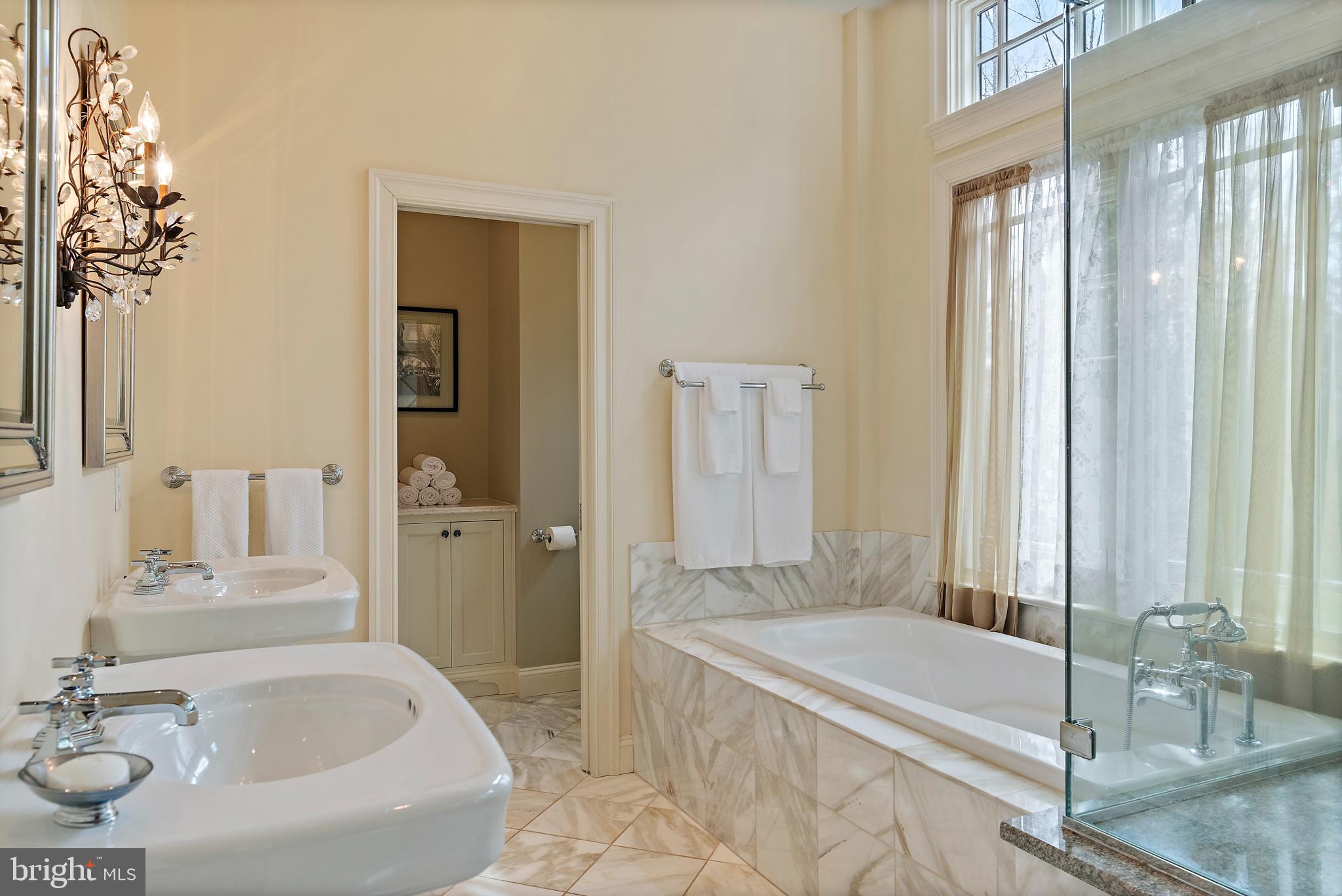 403 Beards Dock Crossing Annapolis, MD 21403 - Photo 47 of 96 a bathroom with a granite countertop tub sink and mirror