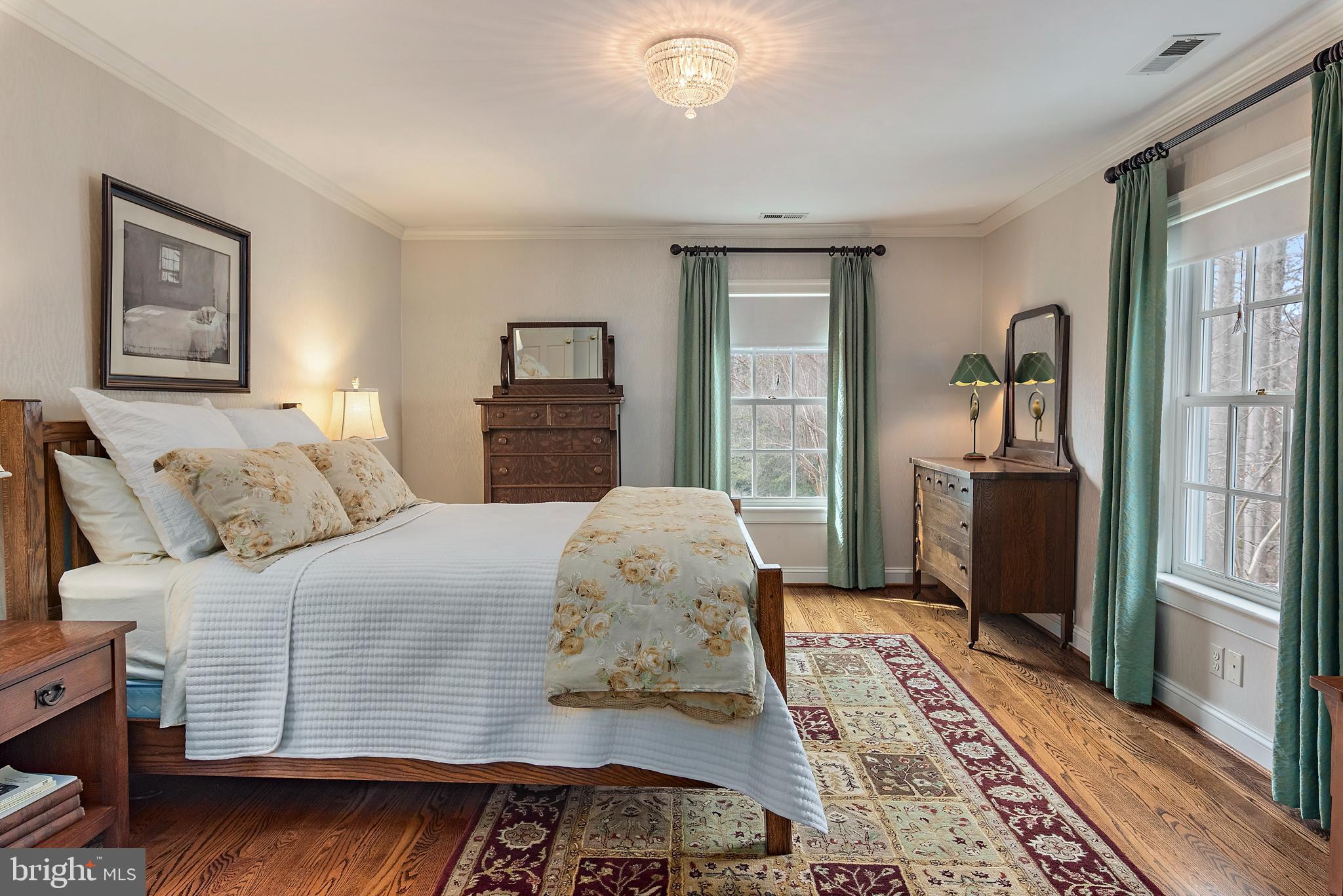 403 Beards Dock Crossing Annapolis, MD 21403 - Photo 64 of 96 a bedroom with a large bed and a dresser
