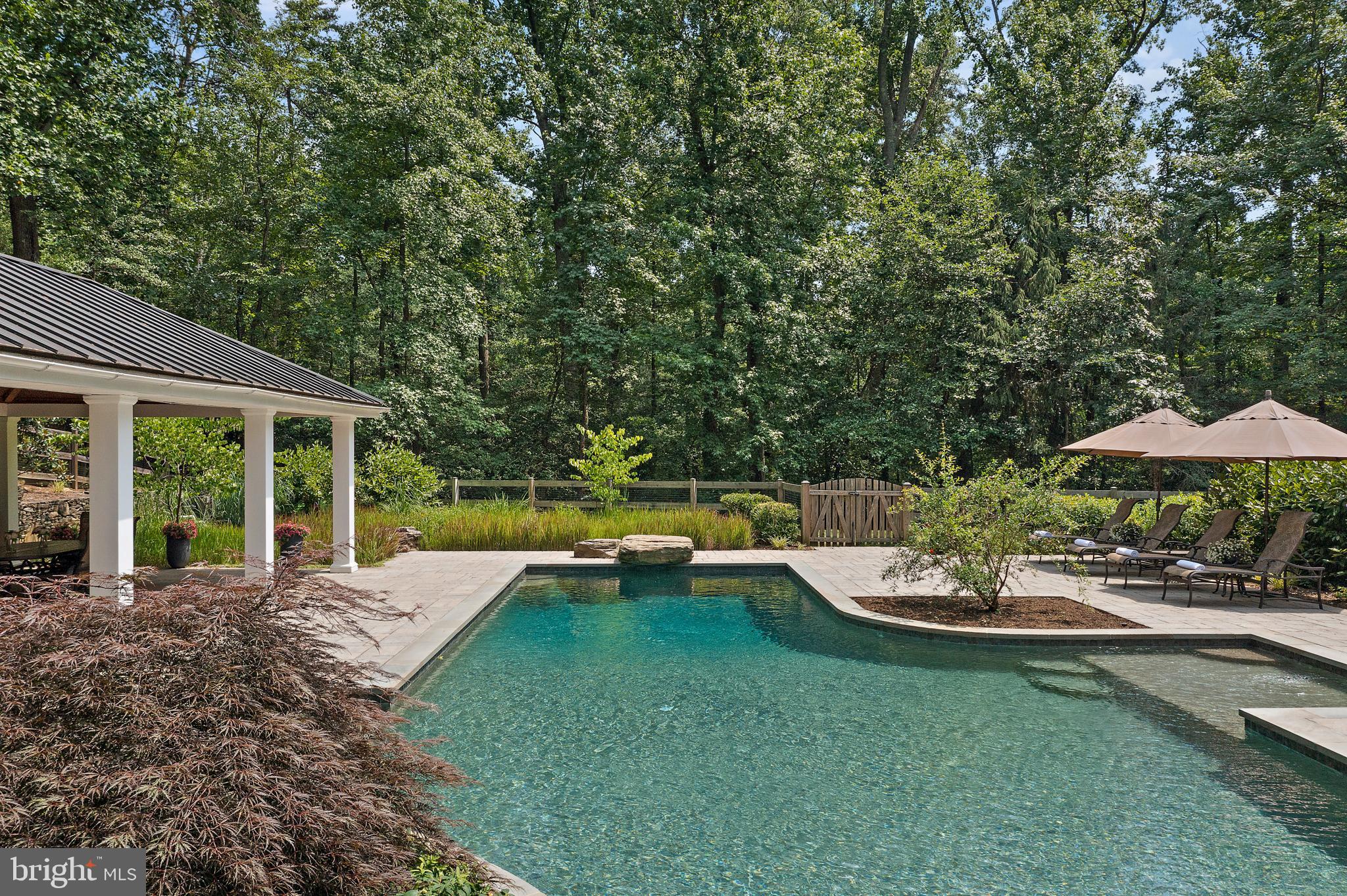403 Beards Dock Crossing Annapolis, MD 21403 - Photo 8 of 96 a view of a house with backyard sitting area and garden