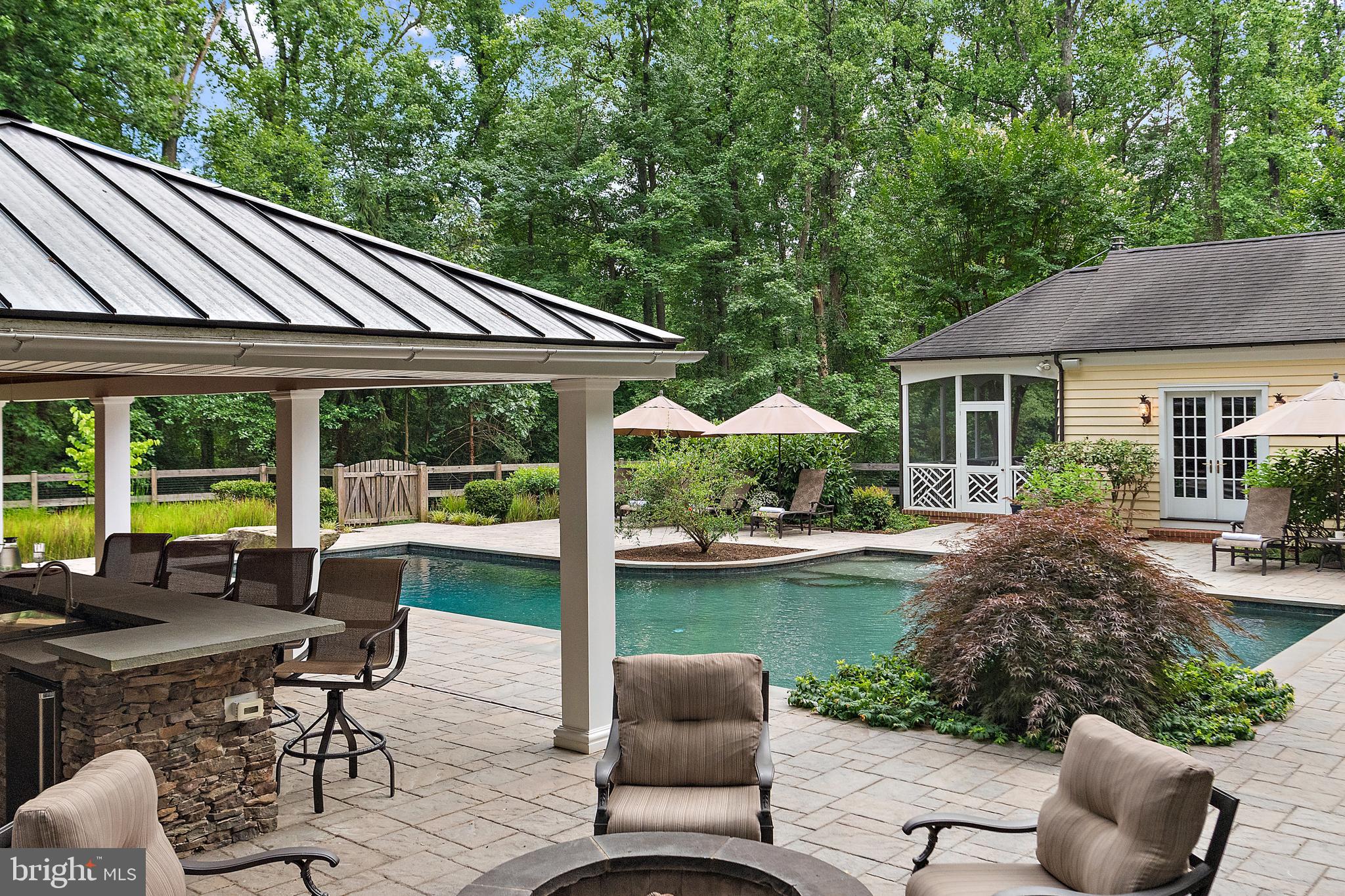 403 Beards Dock Crossing Annapolis, MD 21403 - Photo 82 of 96 a view of a house with backyard sitting area and garden