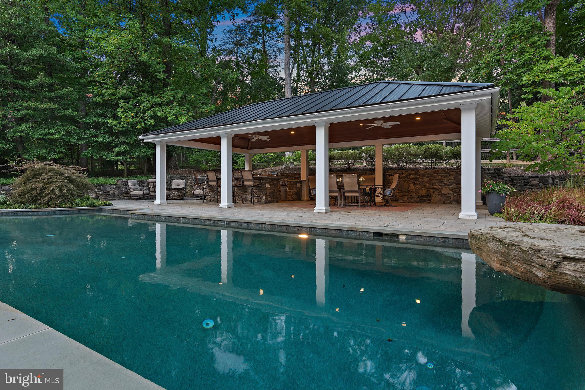 403 Beards Dock Crossing Annapolis, MD 21403 - Photo 88 of 96 a backyard of a house with yard table and chairs