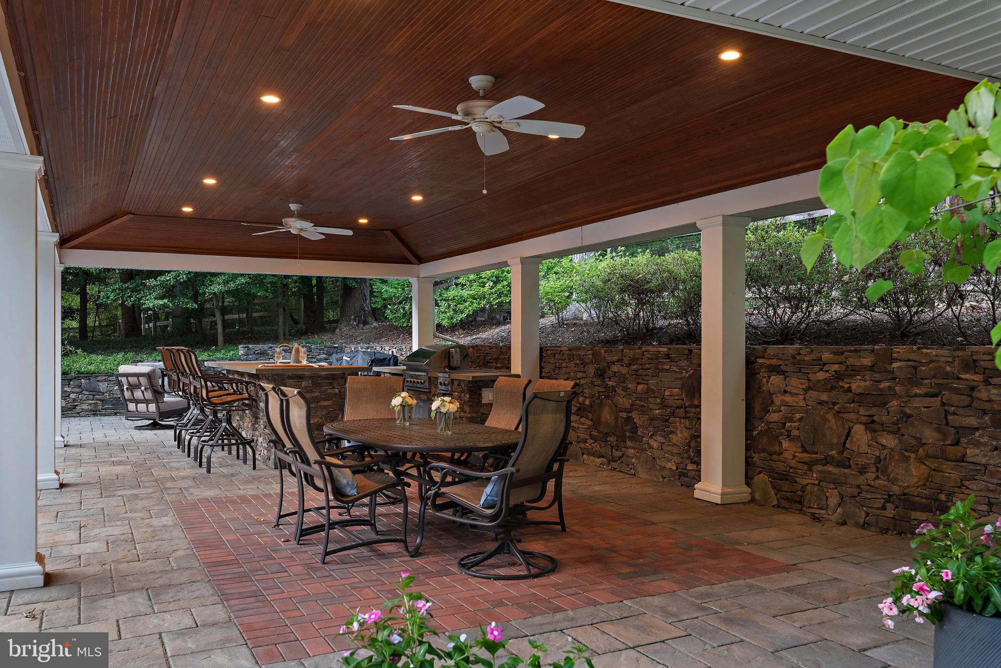 403 Beards Dock Crossing Annapolis, MD 21403 - Photo 90 of 96 a view of a patio with a table and chairs