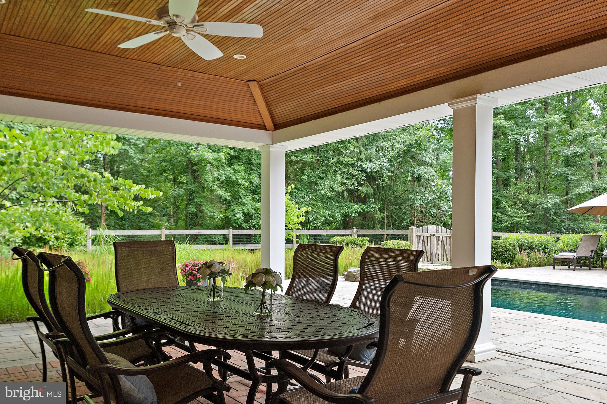403 Beards Dock Crossing Annapolis, MD 21403 - Photo 91 of 96 a view of a patio with a table chairs and a table