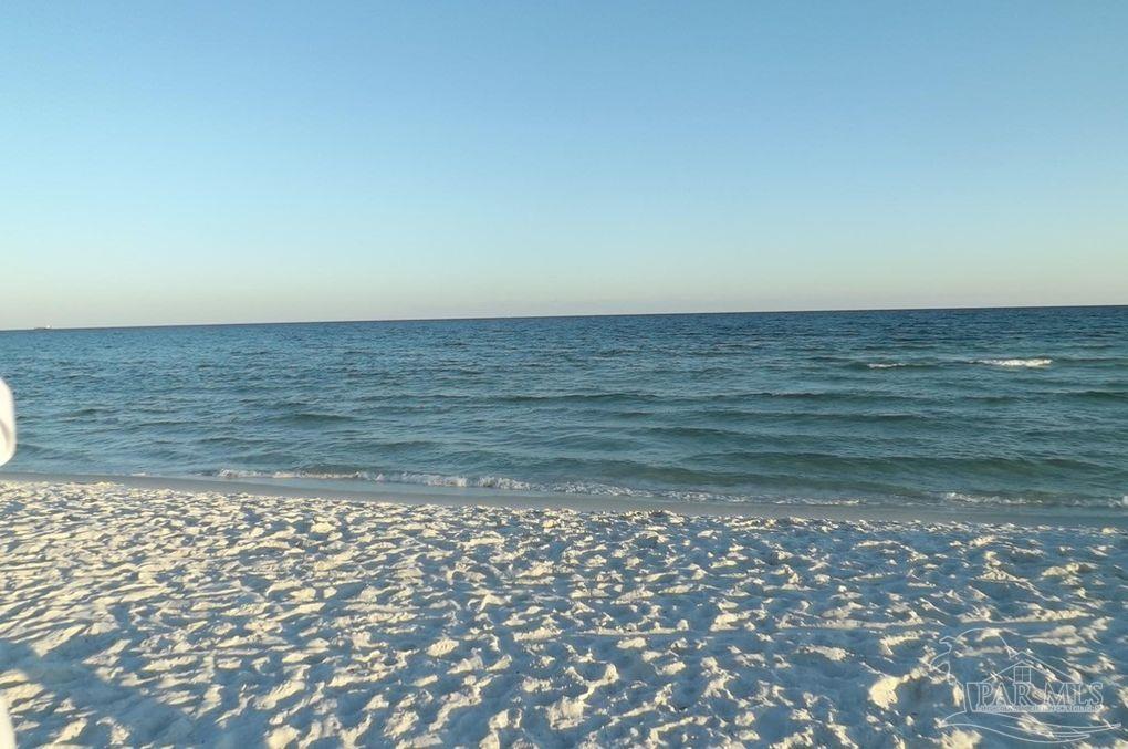 7447 Harvest Village Court Navarre, FL 32566 - Photo 25 of 27 a view of a lake view