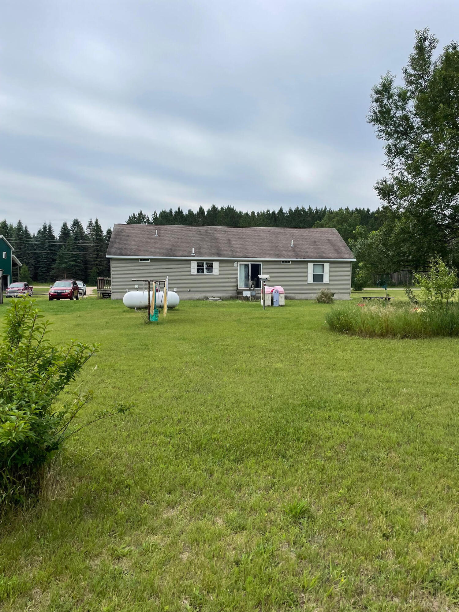 12416 Johnson Road Kaleva, MI 49645 - Photo 3 of 37 Back of home
