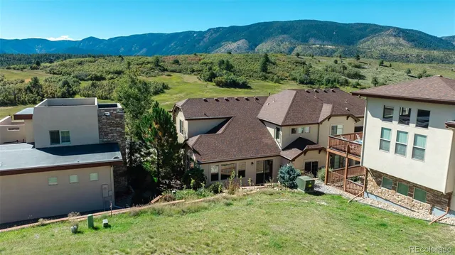 an aerial view of lake residential house with outdoor space