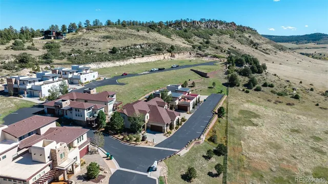 a view of a livingroom with a ceiling fan and window