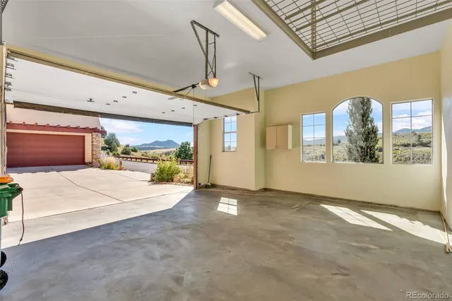 an aerial view of a house with a ocean view