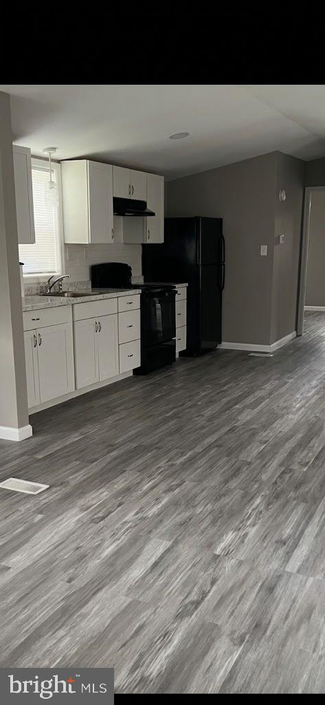 100 Lariat Road Middle River, MD 21220 - Photo 18 of 19 Modern kitchen with sleek finishes.