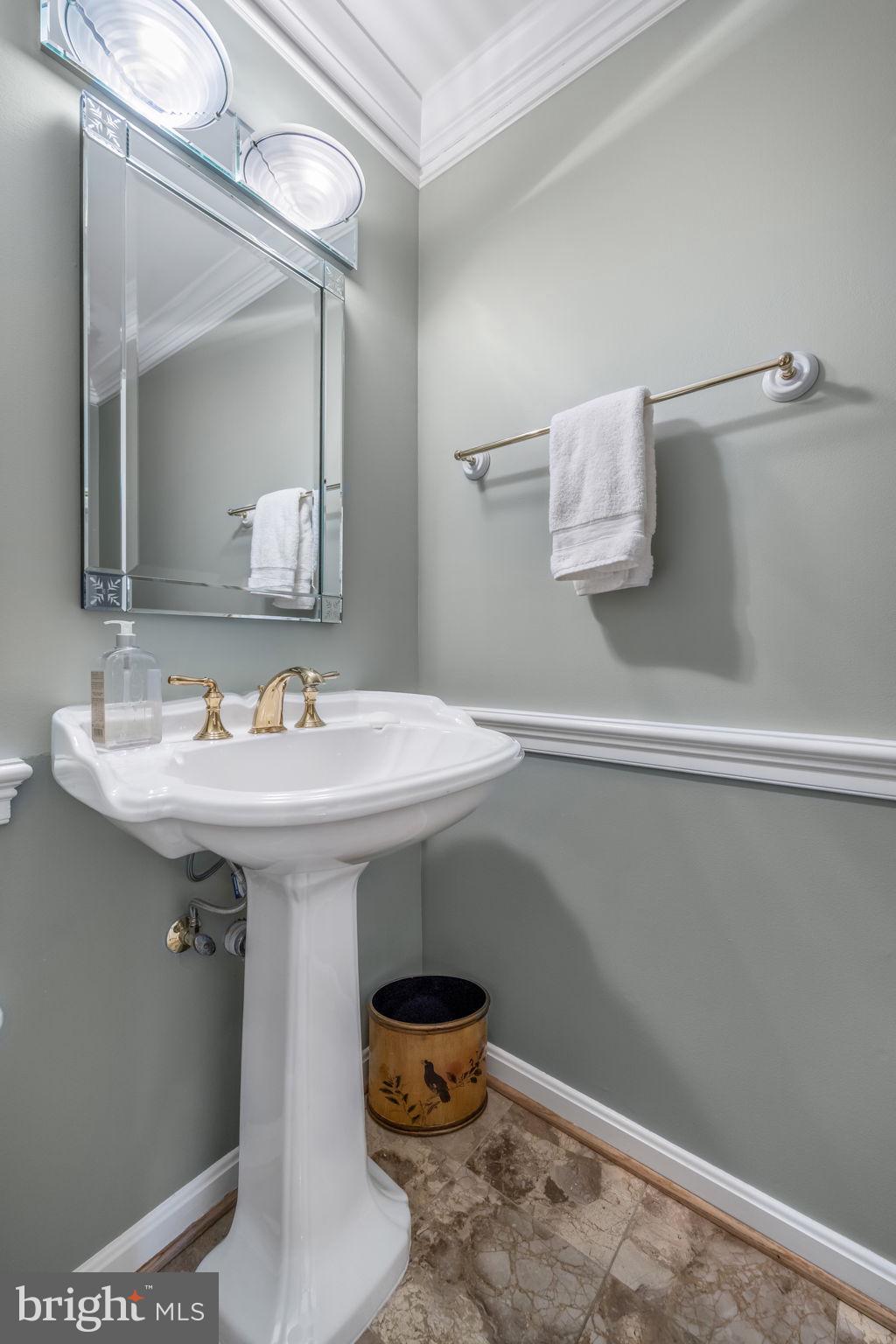 718 Ridge Drive McLean, VA 22101 - Photo 24 of 61 Elegant powder room with modern fixtures.
