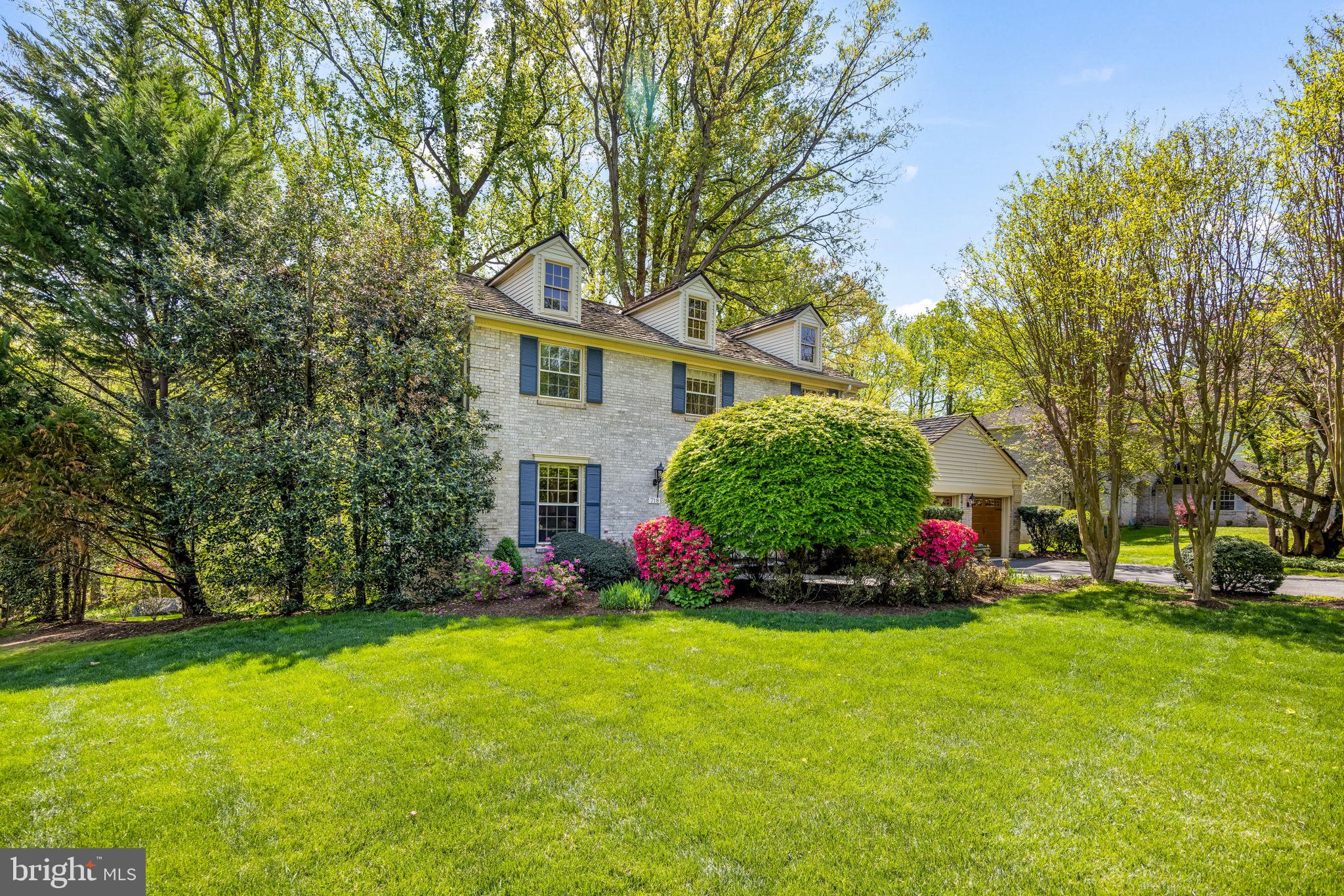718 Ridge Drive McLean, VA 22101 - Photo 3 of 61 Charming home amidst lush greenery.