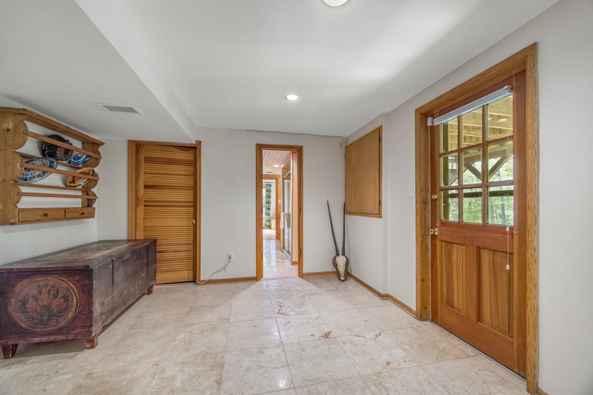 718 Ridge Drive McLean, VA 22101 - Photo 52 of 61 2 doors in lower level that open up to backyard