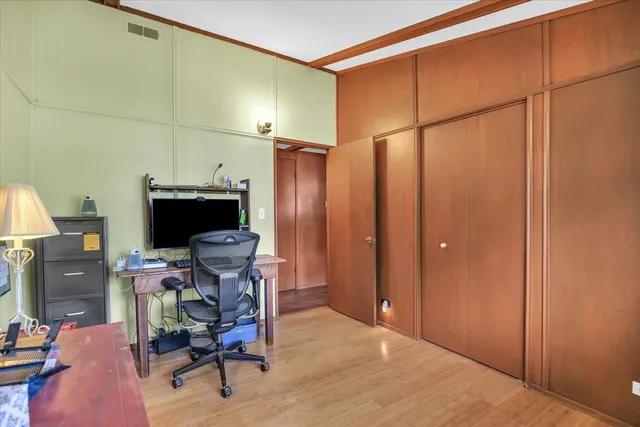 a view of a workspace with furniture