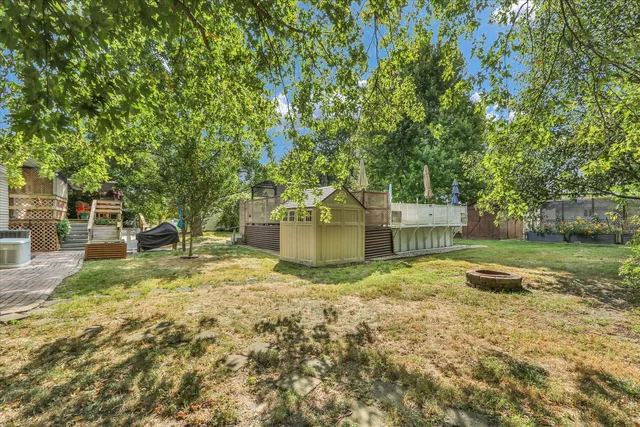 a view of yard and tree