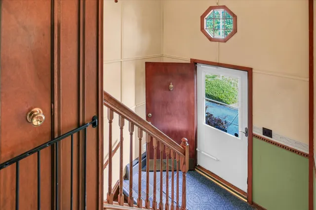 a view of entryway with wooden floor