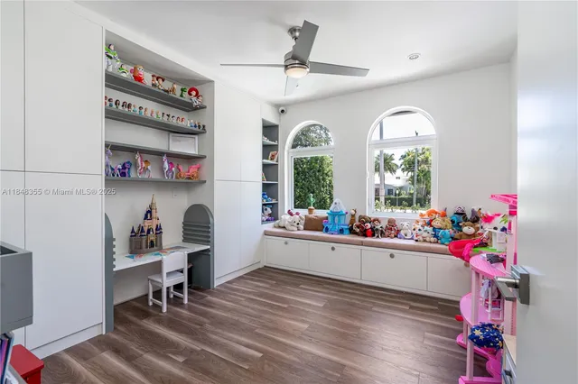 a room with furniture and a wooden floor