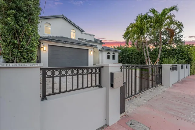 a view of a entrance gate of a house