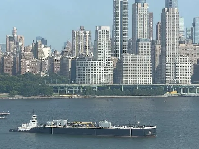 a view of a city with tall buildings