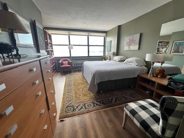 a bed room with a bed and a couch