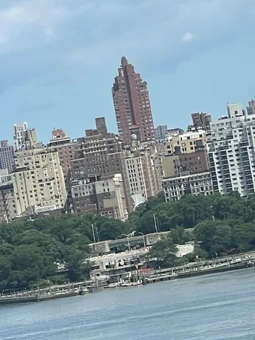 a view of a city with tall buildings