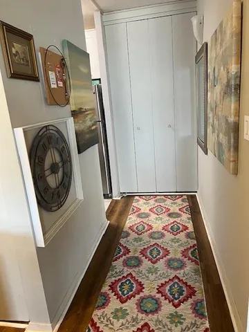 a view of bedroom with washer and dryer