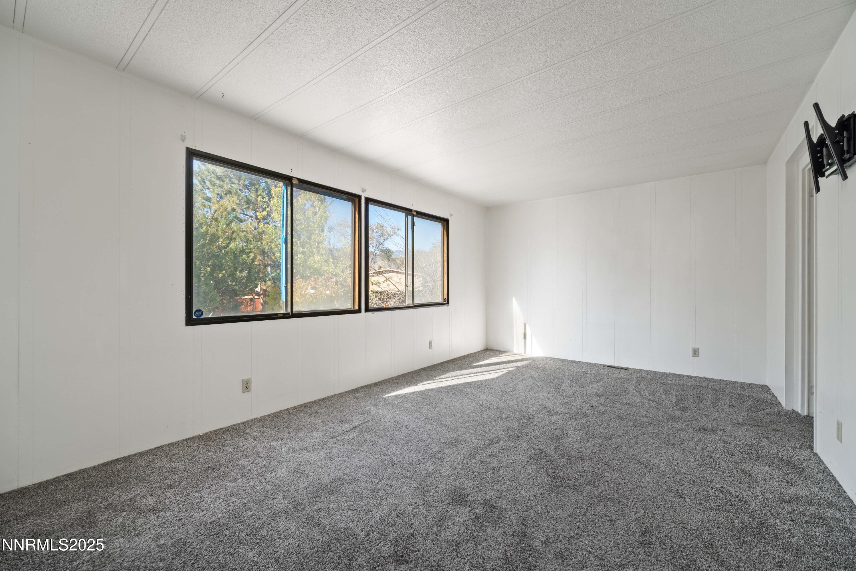2524 Sneddon Way Carson City, NV 89706 - Photo 13 of 34 an empty room with windows