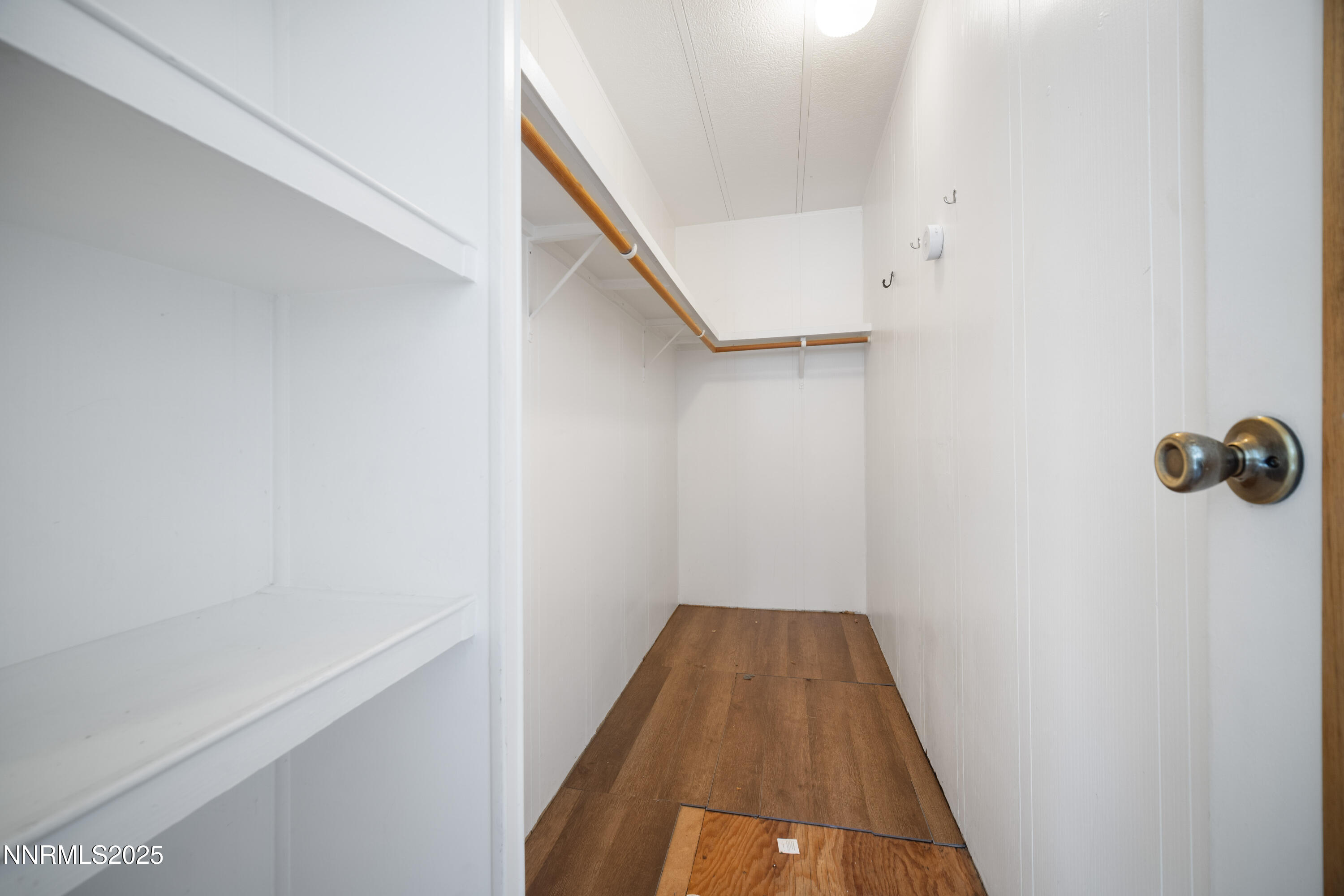 2524 Sneddon Way Carson City, NV 89706 - Photo 15 of 34 a view of a room with wooden floor